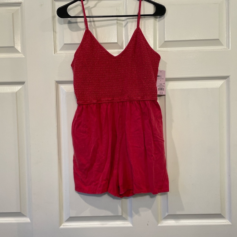 Red/pink romper with pockets. New with tags, never worn